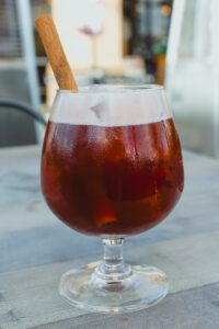 Calling all you brandy drinkers, port lovers, or cognac fans this is for you. This bittersweet cocktail is made with apple brandy, elderberry liqueur, and a touch of lemon. Then, it's served in our brandy snifter glass and swirled with a cinnamon stick.
