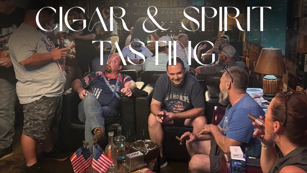 Smiling guests enjoying cigars and conversation inside the Mayor’s Cigar Lounge at The Vineyard Market during a social tasting event.